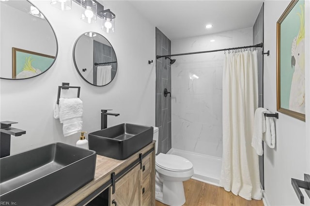 728 23rd St, Newport News, VA 23607 - full bath featuring a shower with curtain, recessed lighting, toilet, vanity, and wood finished floors
