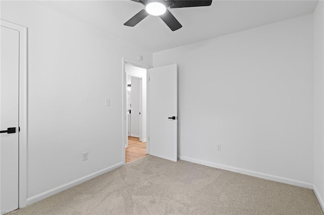 728 23rd St, Newport News, VA 23607 - unfurnished bedroom featuring carpet, baseboards, and a ceiling fan