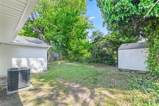728 23rd St, Newport News, VA 23607 - view of yard featuring central AC unit, an outdoor structure, and a storage unit