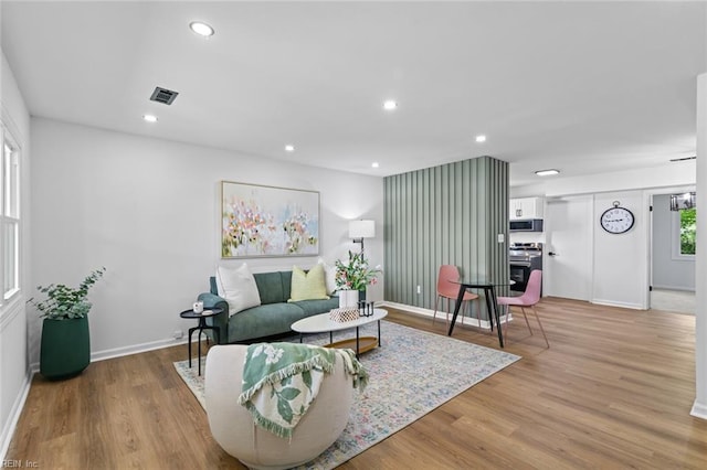 728 23rd St, Newport News, VA 23607 - living room with recessed lighting, baseboards, visible vents, and light wood-style floors