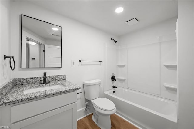 325 S Main St, Suffolk, VA 23434 - bathroom with toilet, tub / shower combination, wood finished floors, visible vents, and vanity