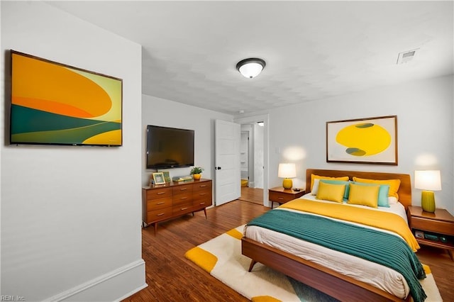 325 S Main St, Suffolk, VA 23434 - bedroom featuring visible vents and wood finished floors