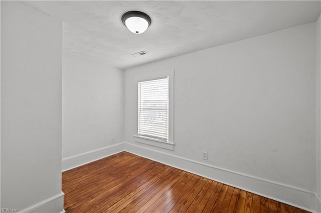 325 S Main St, Suffolk, VA 23434 - unfurnished room with baseboards, dark wood-style floors, and visible vents