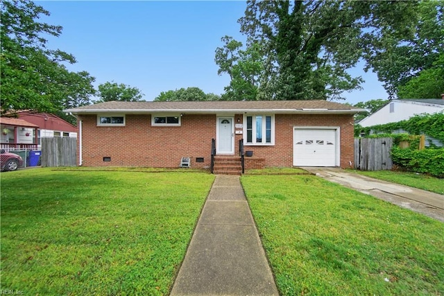 ranch-style home featuring a garage, crawl space, fence, concrete driveway, and a front yard