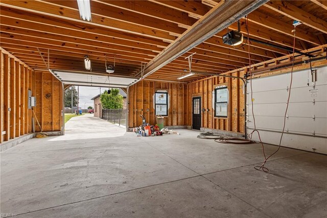 garage featuring a garage door opener