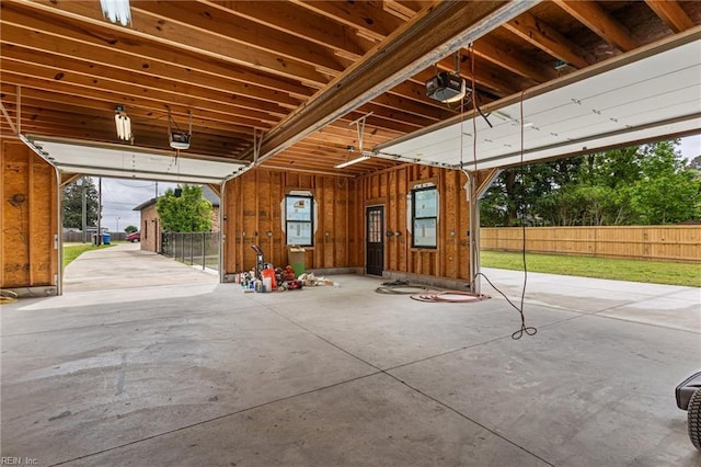 garage featuring a garage door opener