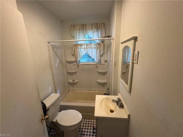 bathroom featuring toilet, bathing tub / shower combination, and vanity