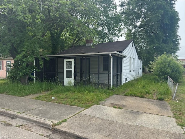 view of outbuilding with a porch
