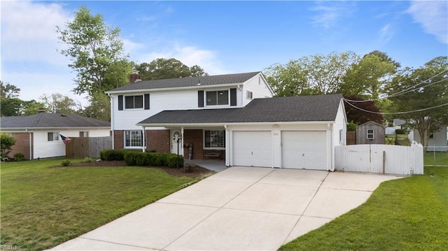 traditional-style home with an attached garage, concrete driveway, a chimney, a gate, and brick siding