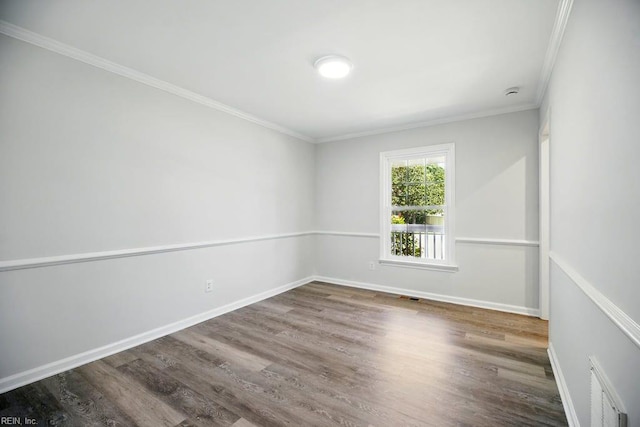 937 Sherry Cir, Newport News, VA 23608 - unfurnished room featuring visible vents, wood finished floors, baseboards, and ornamental molding