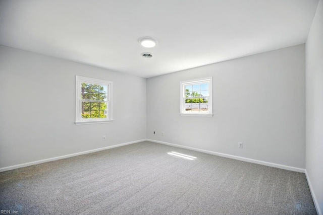 937 Sherry Cir, Newport News, VA 23608 - carpeted spare room featuring a wealth of natural light, visible vents, and baseboards
