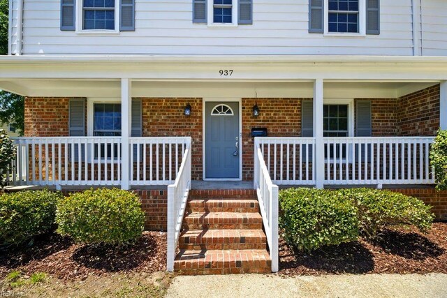 937 Sherry Cir, Newport News, VA 23608 - property entrance featuring brick siding and a porch