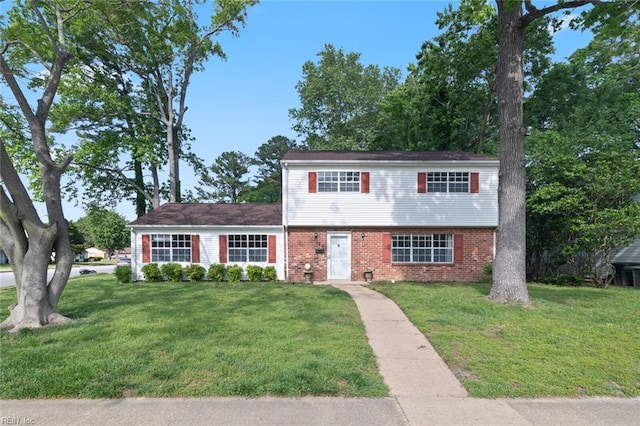 120 Commodore Dr, Hampton, VA 23669 - colonial inspired home with brick siding and a front lawn