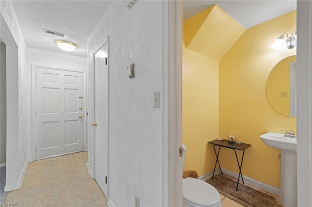 120 Commodore Dr, Hampton, VA 23669 - corridor with tile patterned floors and baseboards