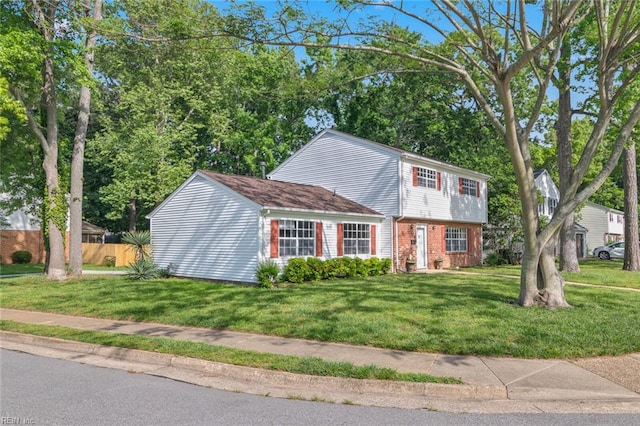 120 Commodore Dr, Hampton, VA 23669 - colonial-style house featuring brick siding
