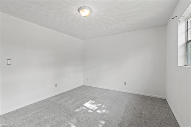 120 Commodore Dr, Hampton, VA 23669 - carpeted empty room featuring baseboards and a textured ceiling