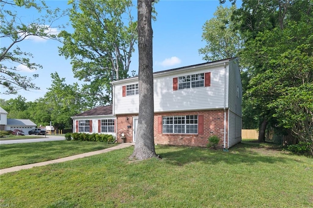 120 Commodore Dr, Hampton, VA 23669 - view of front of house featuring brick siding and a front yard