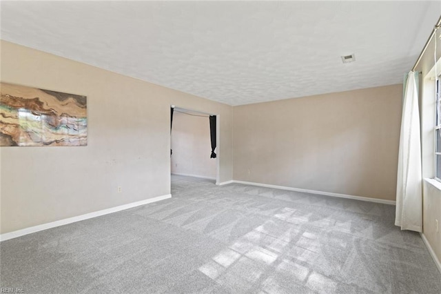 120 Commodore Dr, Hampton, VA 23669 - carpeted spare room featuring baseboards and a textured ceiling