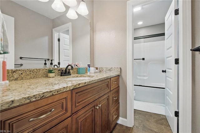 1725 Burson Dr, Chesapeake, VA 23323 - bathroom featuring a chandelier, vanity, bathtub / shower combination, and baseboards