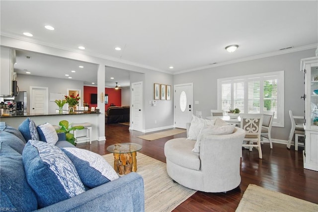 1725 Burson Dr, Chesapeake, VA 23323 - living room with wood finished floors, crown molding, baseboards, and recessed lighting
