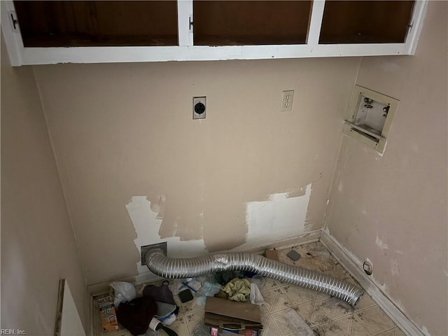 washroom featuring hookup for an electric dryer, cabinet space, and washer hookup