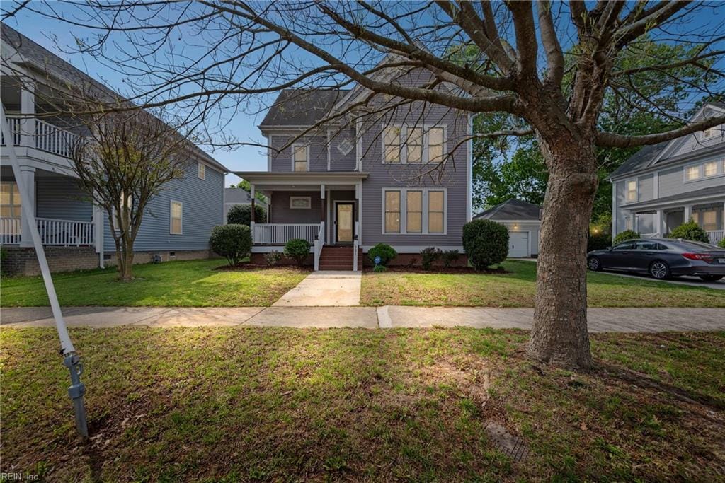 221 W 33rd St, Norfolk, VA 23504 - traditional-style house with a front yard and covered porch