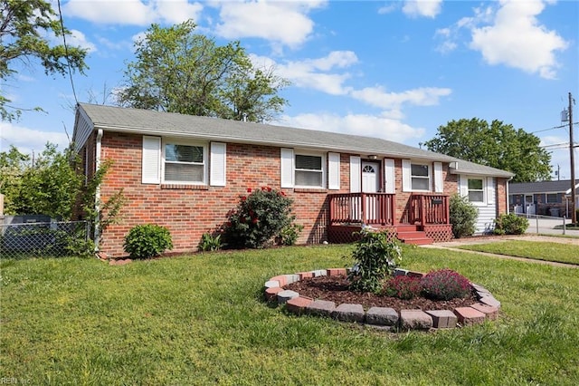 ranch-style home featuring brick siding