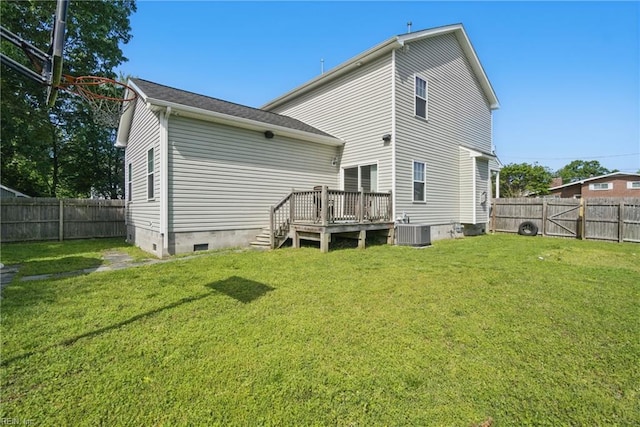 back of house featuring central air condition unit, a deck, a fenced backyard, and crawl space