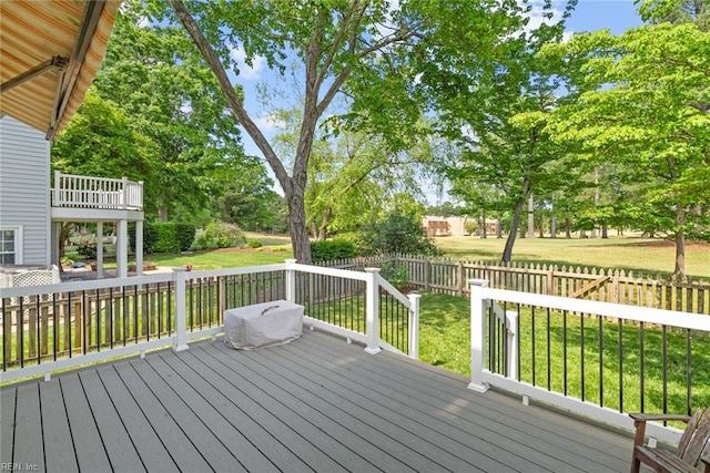 wooden terrace with view of scattered trees