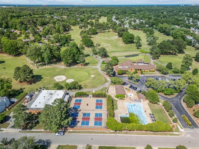 aerial overview of property's location featuring a golf club