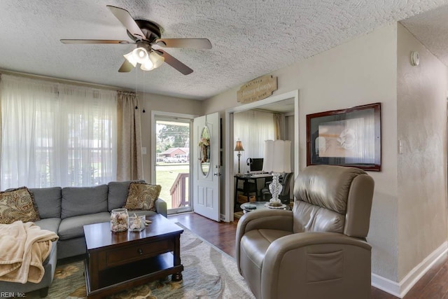 1040 Cox Ave, Chesapeake, VA 23323 - living area with a textured ceiling, ceiling fan, wood finished floors, and baseboards