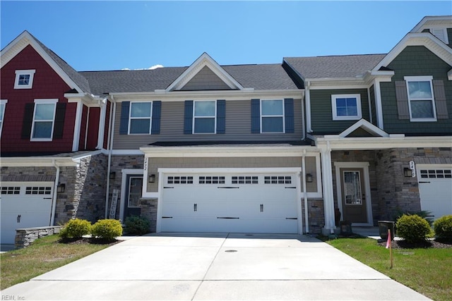 3432 Foxglove Dr, Toano, VA 23168 - view of property with a garage, stone siding, and driveway
