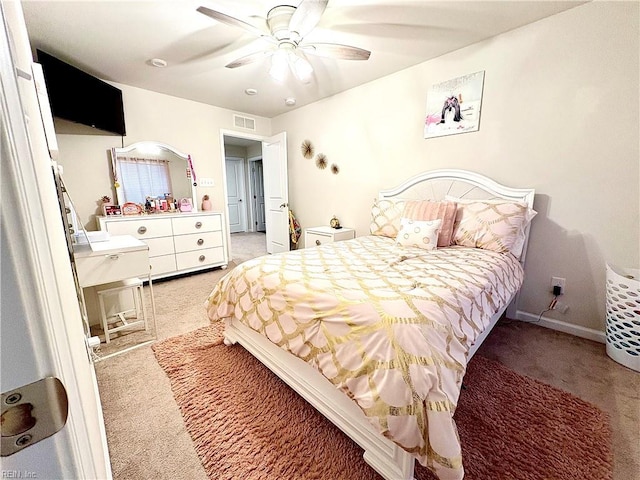3432 Foxglove Dr, Toano, VA 23168 - bedroom featuring light carpet, ceiling fan, and baseboards