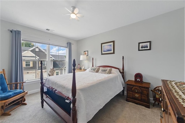 bedroom with carpet floors, ceiling fan, and baseboards