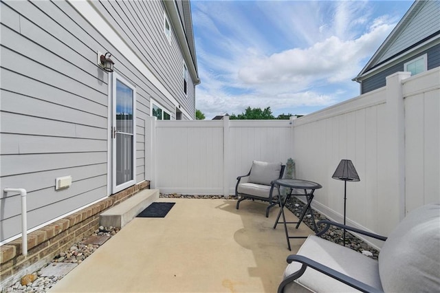 view of patio featuring a fenced backyard
