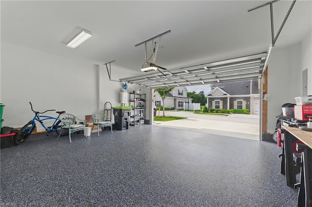 garage featuring a garage door opener