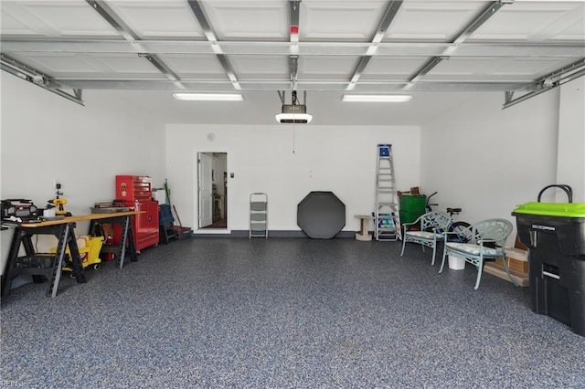 garage featuring a garage door opener