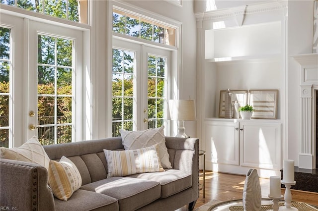 sunroom featuring french doors