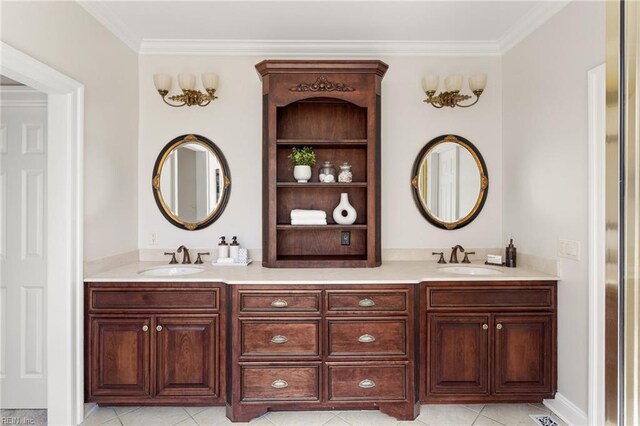 bathroom with crown molding, tile patterned floors, and double vanity