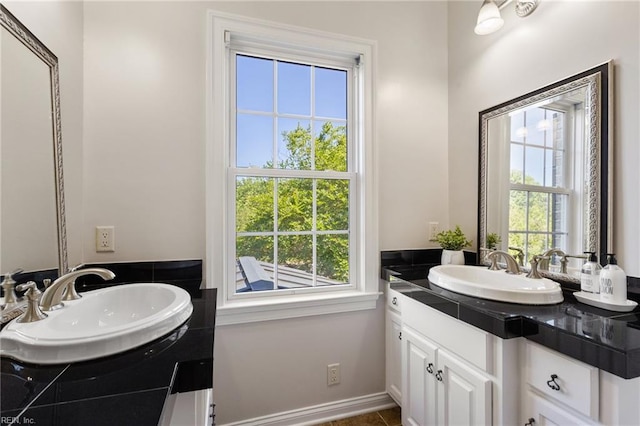 bathroom featuring vanity and plenty of natural light