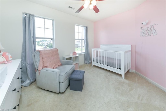 1242 Woods Edge Cir, Suffolk, VA 23434 - bedroom with light colored carpet, a ceiling fan, and baseboards