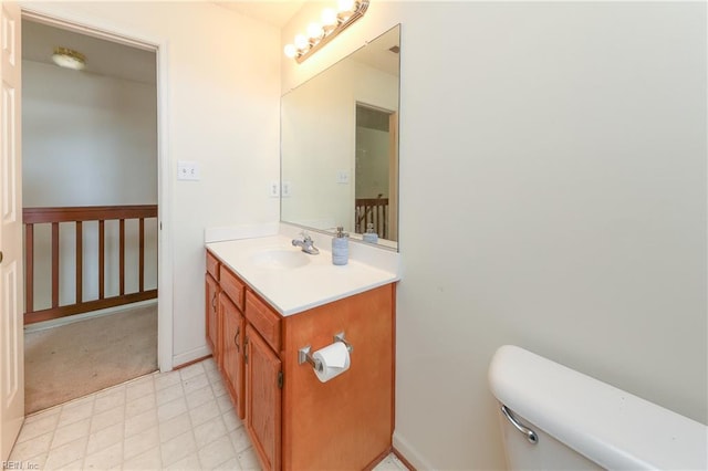 1242 Woods Edge Cir, Suffolk, VA 23434 - bathroom with vanity, toilet, tile patterned floors, and baseboards