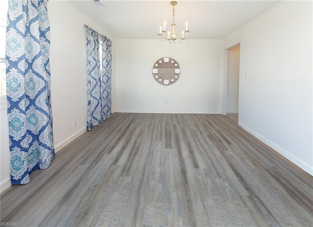 1242 Woods Edge Cir, Suffolk, VA 23434 - unfurnished dining area featuring a chandelier and baseboards