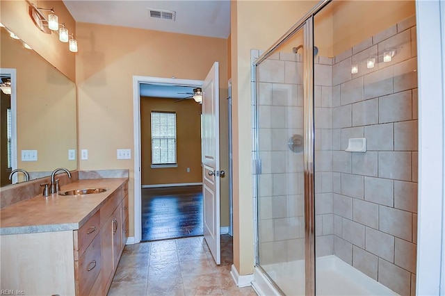 1400 Granby St Unit 309, Norfolk, VA 23510 - full bath with a stall shower, vanity, baseboards, and a ceiling fan