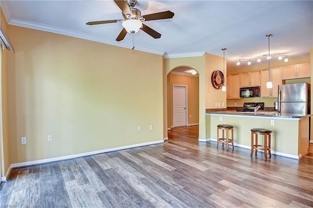 1400 Granby St Unit 309, Norfolk, VA 23510 - kitchen featuring black microwave, freestanding refrigerator, range, dark countertops, and arched walkways