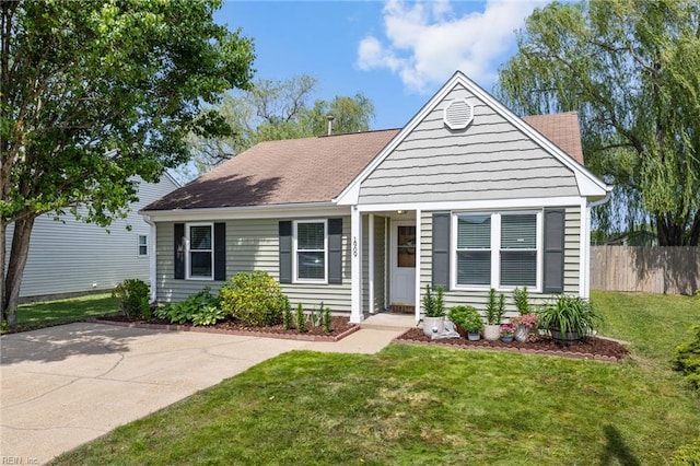 view of front of property with roof with shingles