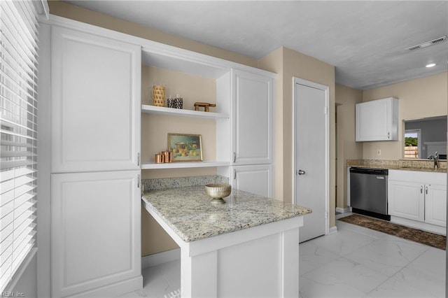 kitchen with dishwasher, light marble finish floors, open shelves, and white cabinets