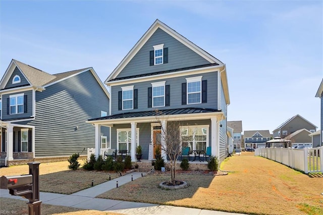 909 Porte Crayon St, Chesapeake, VA 23323 - traditional-style home featuring a standing seam roof, covered porch, and metal roof