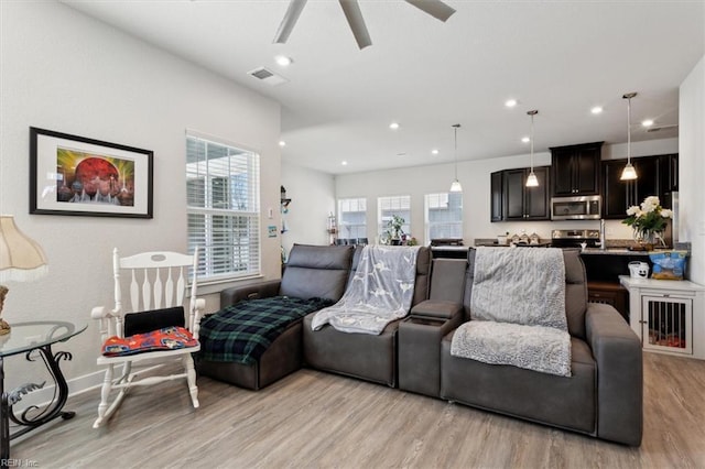 909 Porte Crayon St, Chesapeake, VA 23323 - living room with light wood-type flooring, a ceiling fan, and recessed lighting