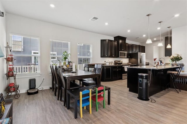 909 Porte Crayon St, Chesapeake, VA 23323 - dining area featuring light wood-style floors, healthy amount of natural light, and recessed lighting